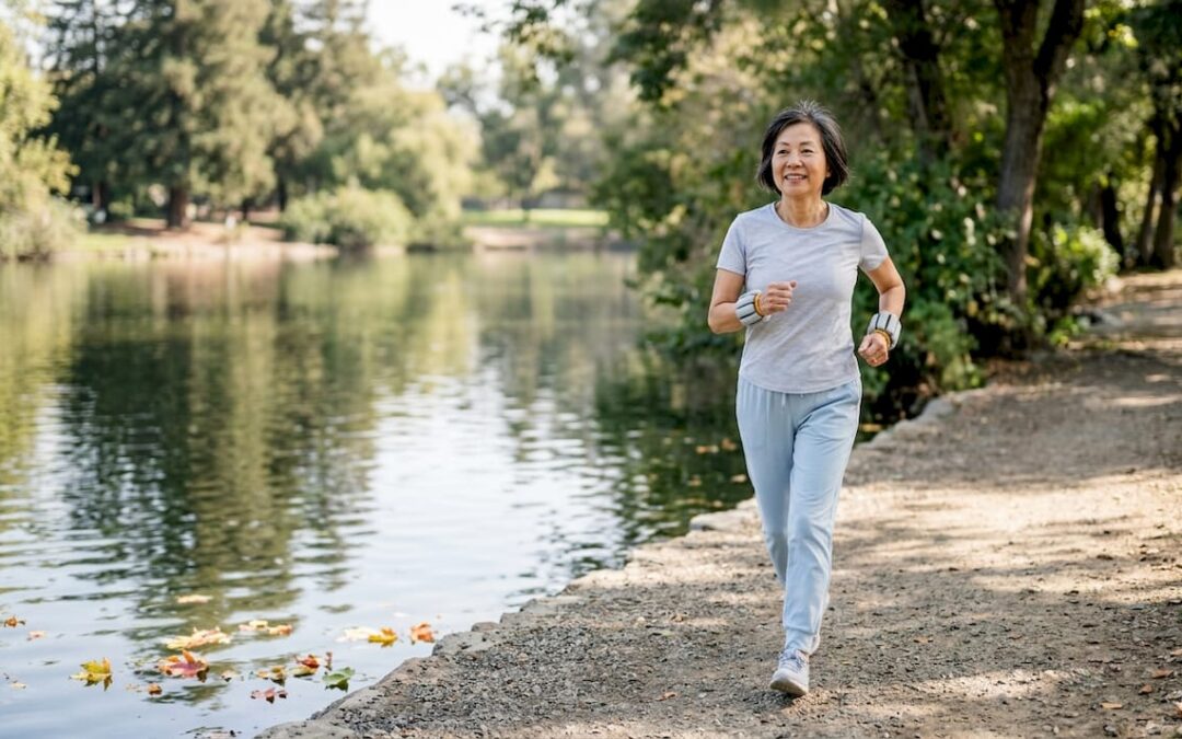 Older woman walking outdoors exercising for bone health