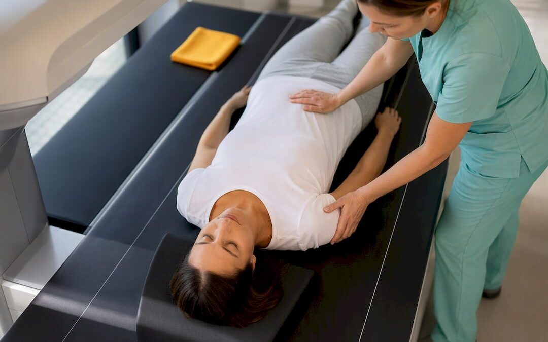 Patient positioned for spine DXA scan